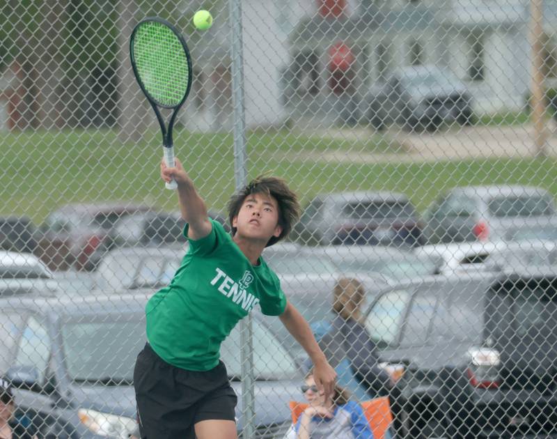 L-P's Jason Lu serves the ball on Tuesday, April 21, 2026 in the Henderson-Guenther Tennis Facility at Ottawa High School.