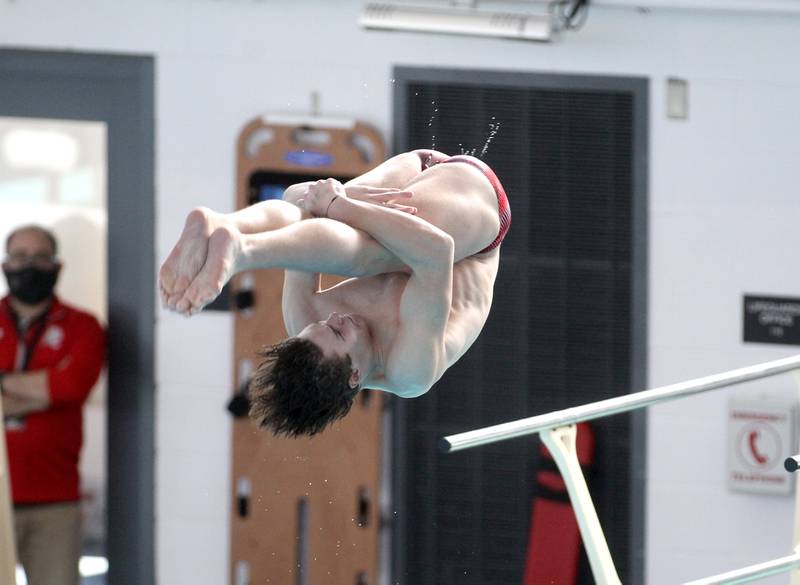 Hinsdale Central’s Conor Furlong competes in the 1-meter diving event during the IHSA Boys Swimming and Diving Championships at FMC Natatorium in Westmont on Saturday, Feb. 26. 2022.