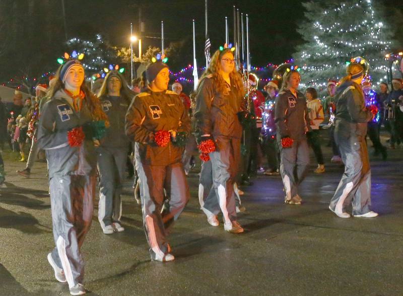 Princeton High School poms squad march in the inaugural Lighted Christmas Parade on Friday, Dec. 1, 2023 in Princeton.