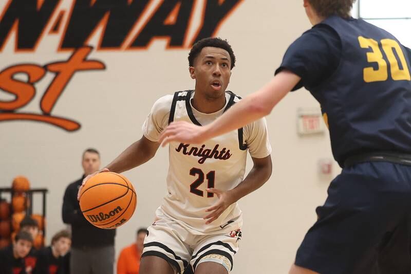 Lincoln-Way West’s Eiden Kubilius looks for a play against Neuqua Valley on Saturday, Feb. 1, 2025.
