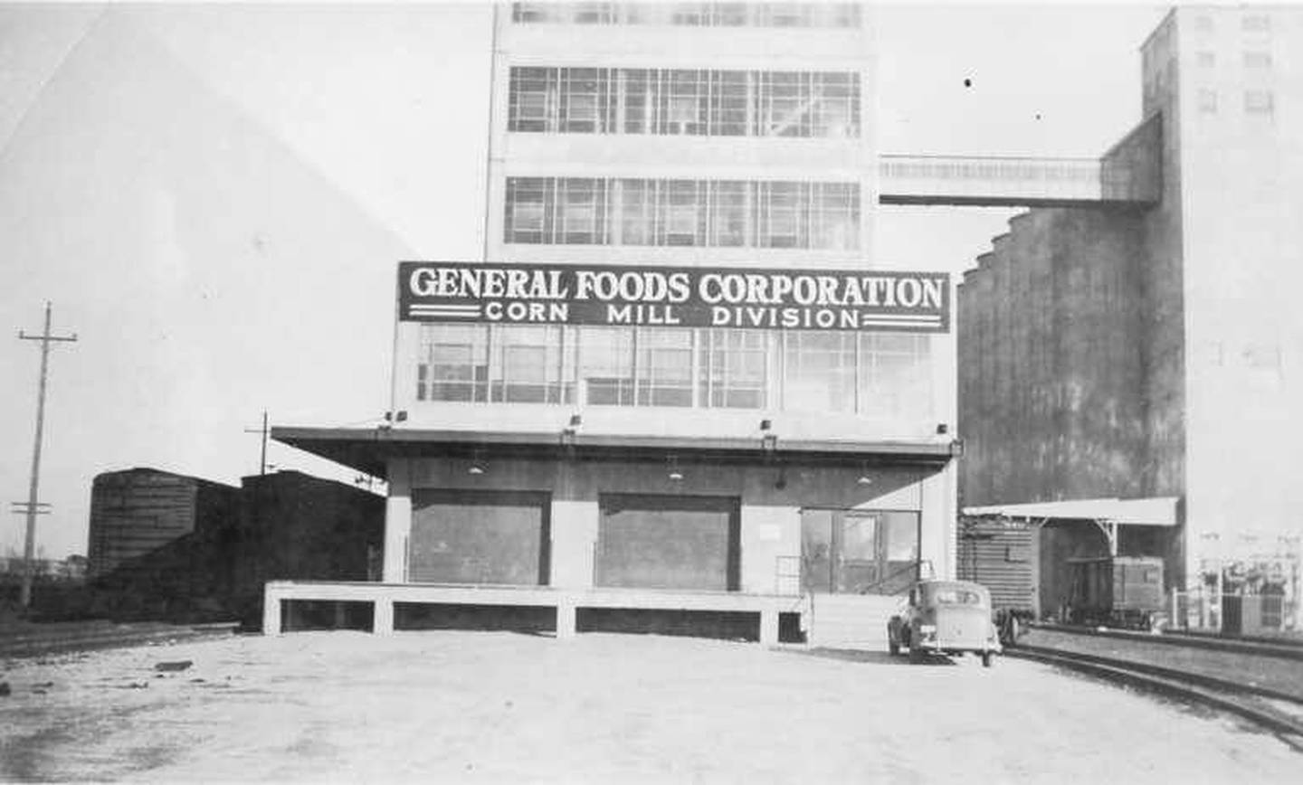 General Foods Corporation Corn Mill is pictured in this 1936 photograph from the Kankakee County Museum. Located east of Hobbie Avenue, south of New York Central railroad tracks, the mill was part of the larger General Foods Corporation, which was a major player in the food industry during the 20th century.