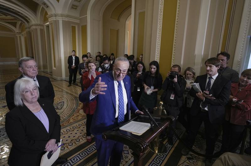 Senate Majority Leader Chuck Schumer, D-N.Y., joined from left by Sen. Patty Murray, D-Wash., Majority Whip Dick Durbin, D-Ill., and Sen. Debbie Stabenow, D-Mich., speaks to reporters following a closed-door policy meeting on the lame duck agenda, at the Capitol in Washington, Tuesday, Nov. 15, 2022. (AP Photo/J. Scott Applewhite)