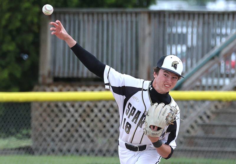 Sycamore's Jack Montani throws the ball to first Wednesday, May 13, 2026, during their game against Morris at the Sycamore Community Sports Complex.