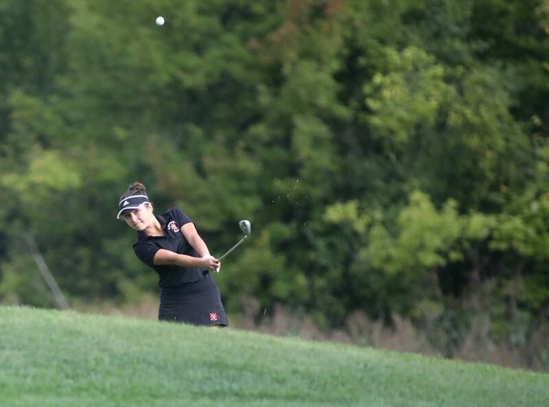 St. Charles East’s Manuela Ramirez hits onto the green during the Class 2A Glenbard North Regional girls golf meet at Bloomingdale Golf Club on Thursday, Sept. 28, 2023.