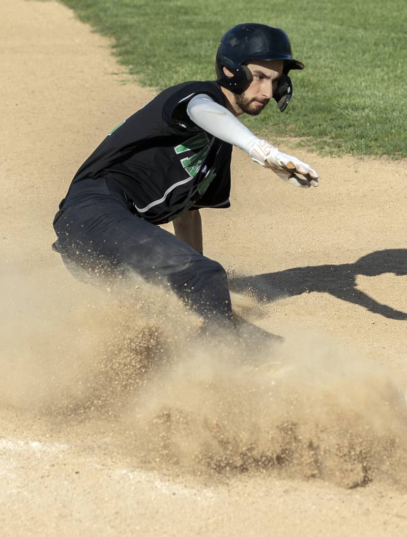 North Boone’s JJ Ford steals third against Dixon Tuesday, May 6, 2025.