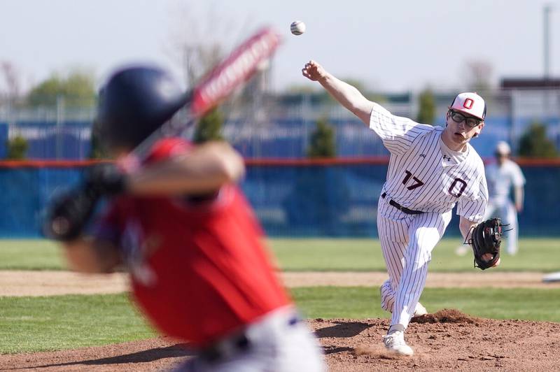 Oswego’s Hayden Bowman (17) delivers a pitch against West Aurora during a baseball game at Oswego High School on Thursday, April 25, 2024.