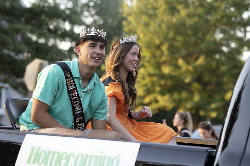 King Austin Casteneda and Queen Kacie Witherow ride through the Rock Falls homecoming parade Thursday, October 10, 2024.