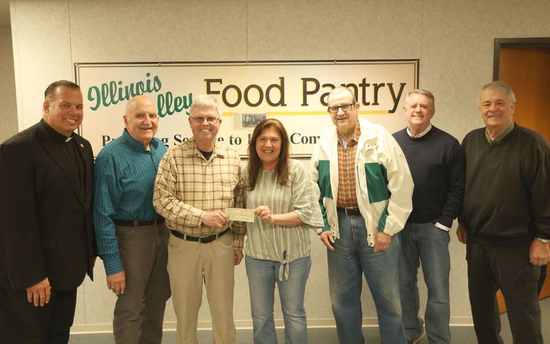 The Utica Knights of Columbus dontated $2,500 to the Illinois Valley Food Pantry on Tuesday, April 28, 2026 in Peru. Gathered at the check presentation were (from left) Rev. Jeffery Windy, John Koehler, Ed Brown, Grand Knight, Mary Jo Credi, Illinios Valley Food Pantry executive director, Mike Brown, Greg Scullans and Chuck Voreis.