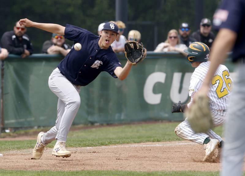 Cary-Grove's Evan Frangiamore fields the ball as cls26\ slides into third base during the IHSA Class 3A Grayslake Central Sectional Championship baseball game on Saturday, June 7, 2025, at Grayslake Central High School.