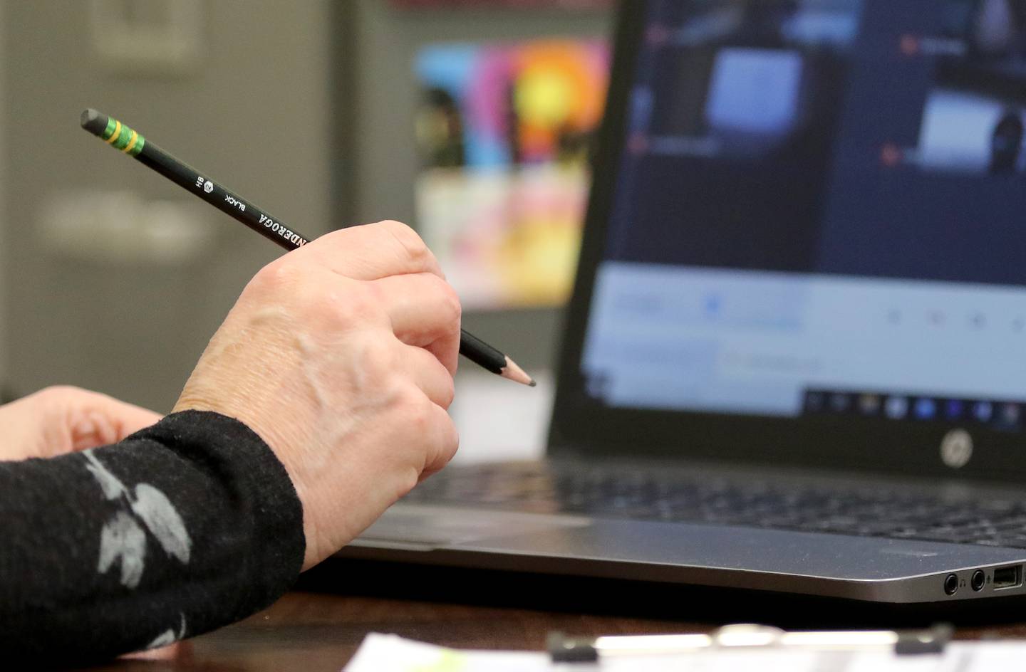 Teacher Laura Wright helps remote learning sixth grade students with their homework after school from her classroom at Marengo Community Middle School on Wednesday, March 24, 2021 in Marengo.