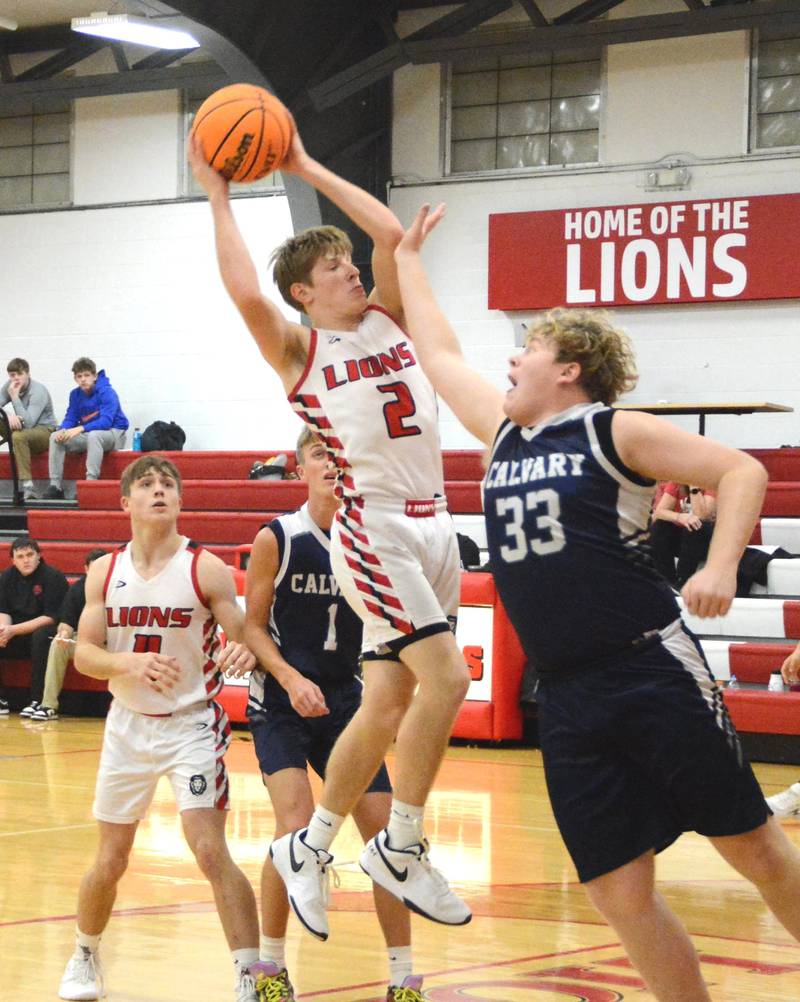 LaMoille's Brayden Klein makes his move against Calvary Christian during Thursday's LaMoille Holiday Classic action. The Lions won 55-49.