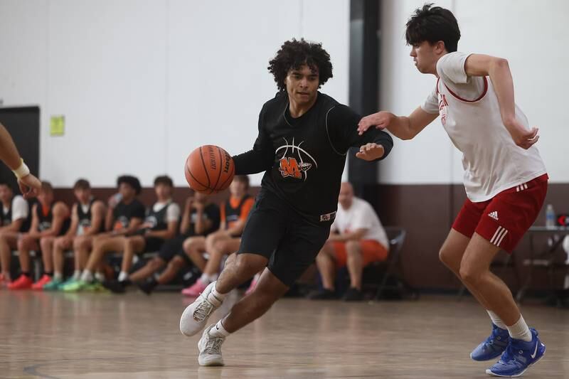 A Minooka player drives to the basket against Marmion at the 37th Morris Boys Shootout on Tuesday, June 25, 2024.