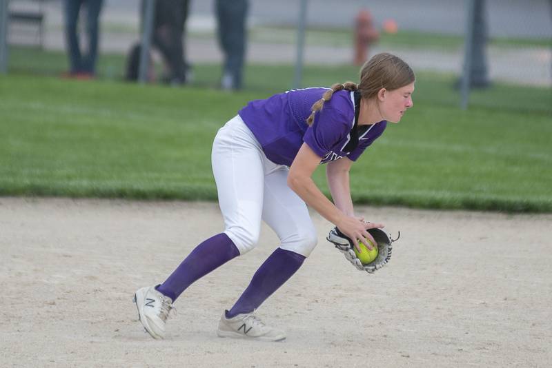 Dixon's Ava Valk fields a grounder against Rochelle for an out Tuesday, May 24, 2022.