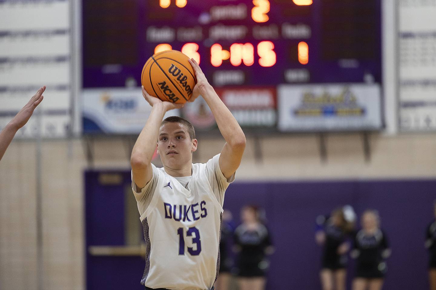 Dixon’s Cullen Shaner puts up a three against Geneseo Monday, Nov. 25, 2024.