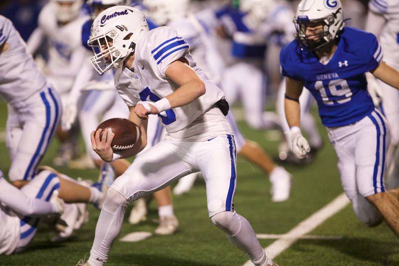 Burlington CentraL'S TYLER MCGladdery runs the ball for a gain against Geneva at the Class 6A second-round playoff game on Saturday Nov.9,2024 in Geneva.