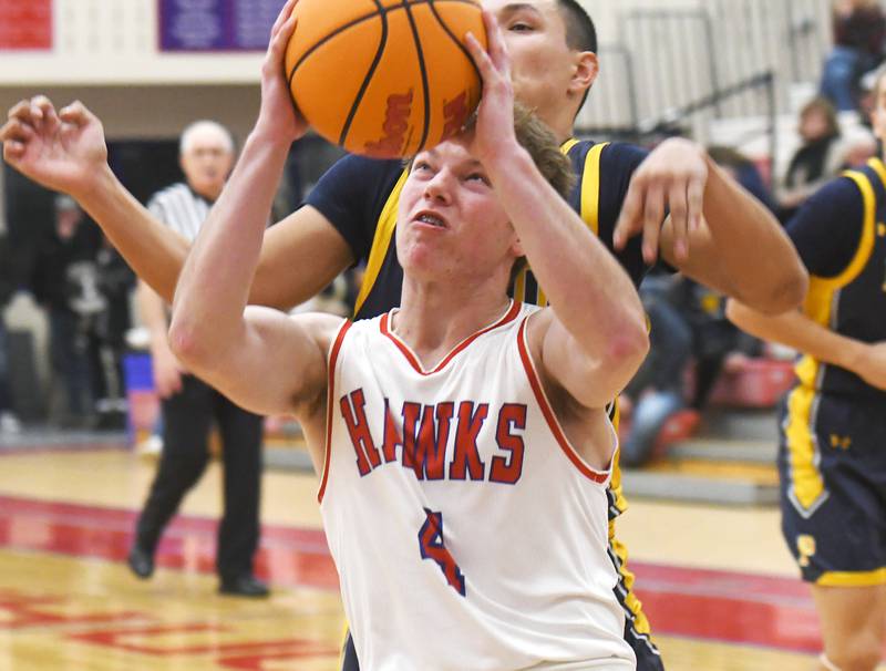 Oregon's Landon Anderson (4) puts up a shot against Polo on Friday, Dec. 5, 2025 at the Blackhawk Center in Oregon.