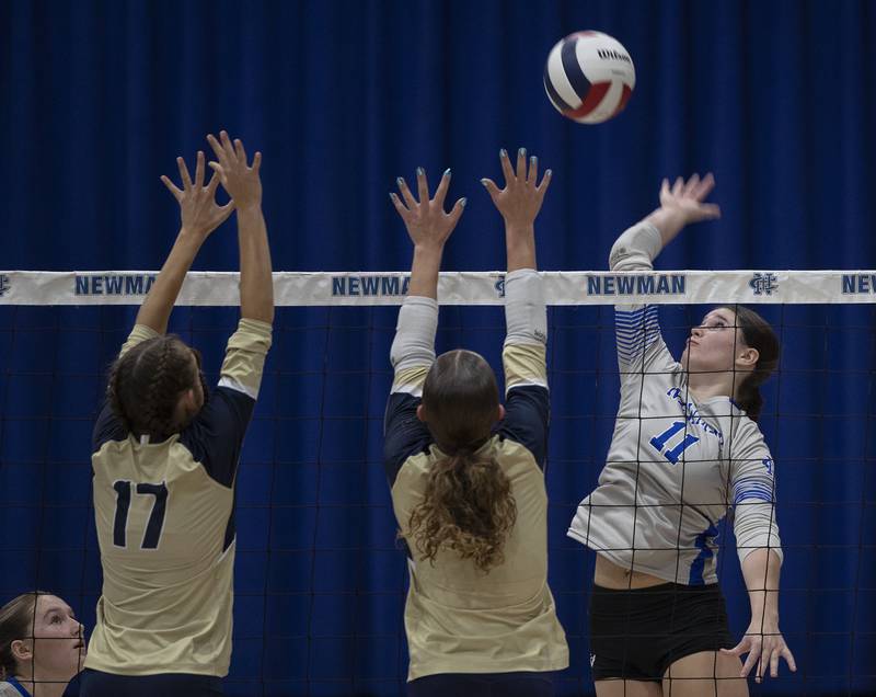 Newman’s Isabelle Lanning goes up for a hit against Mercer County Wednesday, Sept. 24, 2025.