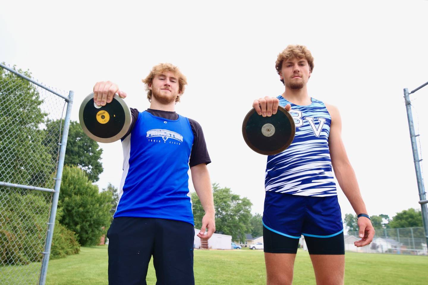 Princeton's Ian Morris (left) and Bureau Valley's Landon Hulsing brought home two state championships in the discus to Bureau County. Morris won the 2A title while Hulsing set a school record to win the 1A crown.