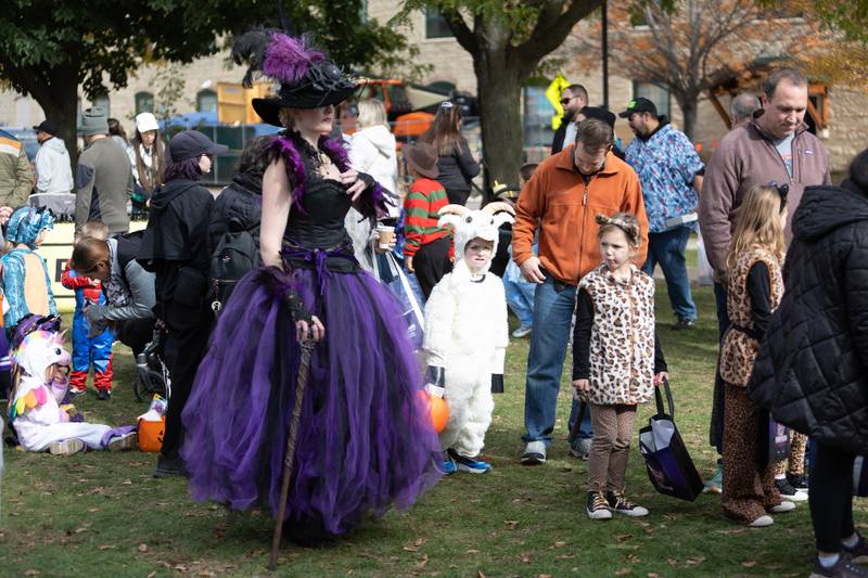 Locals line up for candy at BatFest on Saturday, Oct. 25, 2025, in downtown Batavia.
