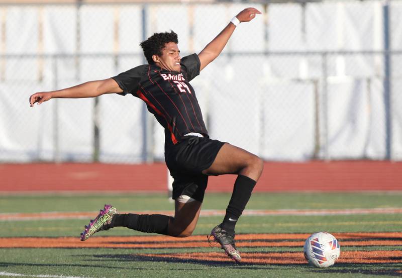 DeKalb's Josiah Antimo fires a shot past the Sycamore goalie putting DeKalb up 2-0 in their game Tuesday, Oct. 4, 2022, at DeKalb High School.