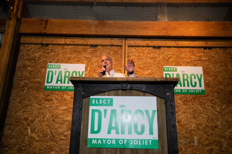 Terry D'Arcy talks to a room full of supporters after his opponent incumbent Bob O'Dekirk conceded the mayoral race election night event at Inwood Golf Course, in Joliet, on Tuesday, April 4, 2023.