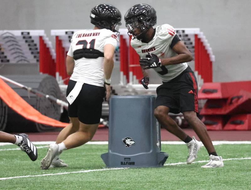 Northern Illinois’  Owen Belman (left) and Jacob Finley participates in a drill Wednesday, July 30, 2025, in the Chessick Practice Center at NIU in DeKalb.
