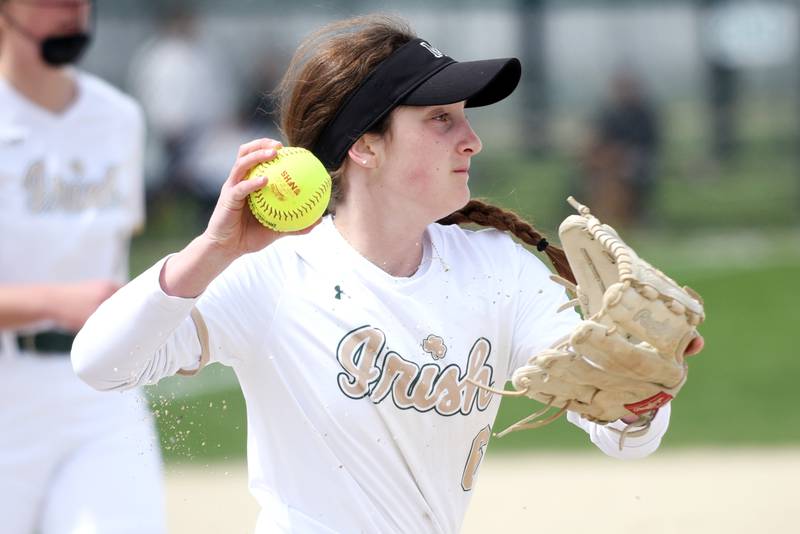 Bishop McNamara's Camille Czako throws to first base during a home game against St. Laurence Saturday, April 11, 2026.