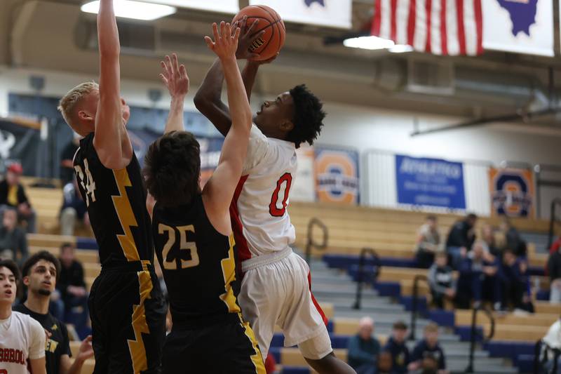 Bolingbrook’s Mekhi Cooper puts up a shot against Andrew in the Class 4A Oswego Sectional semifinal. Wednesday, Mar. 2, 2022, in Oswego.