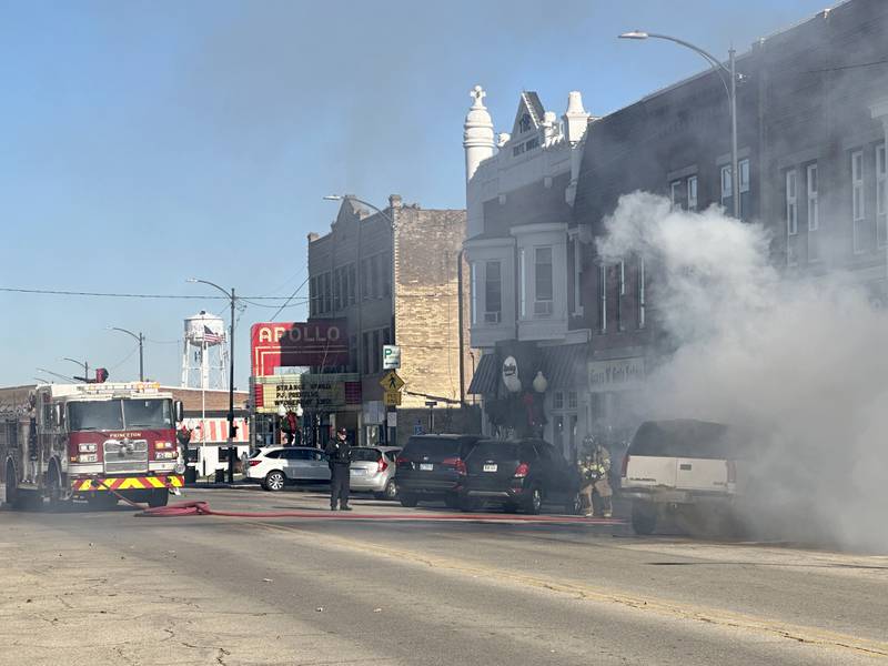 Princeton firefighters work the scene of a vehicle fire in the 500 block of South Main Street on Monday, Nov. 21, 2022 in Princeton. The fire began around 10:45a.m.