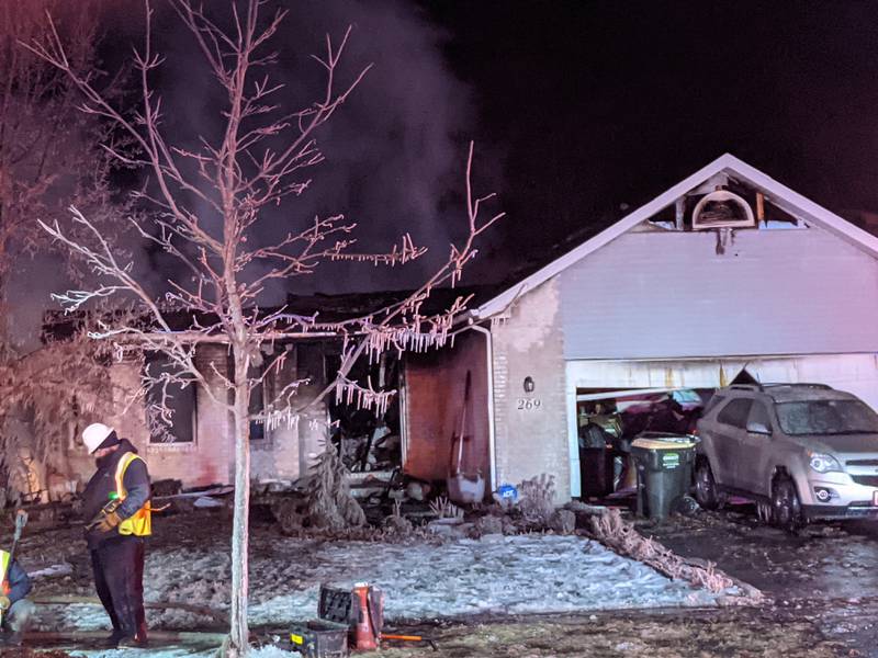 Firefighters respond to a house explosion in the 200 block of Fox Chase North in Oswego on Thursday, Jan. 29, 2026.