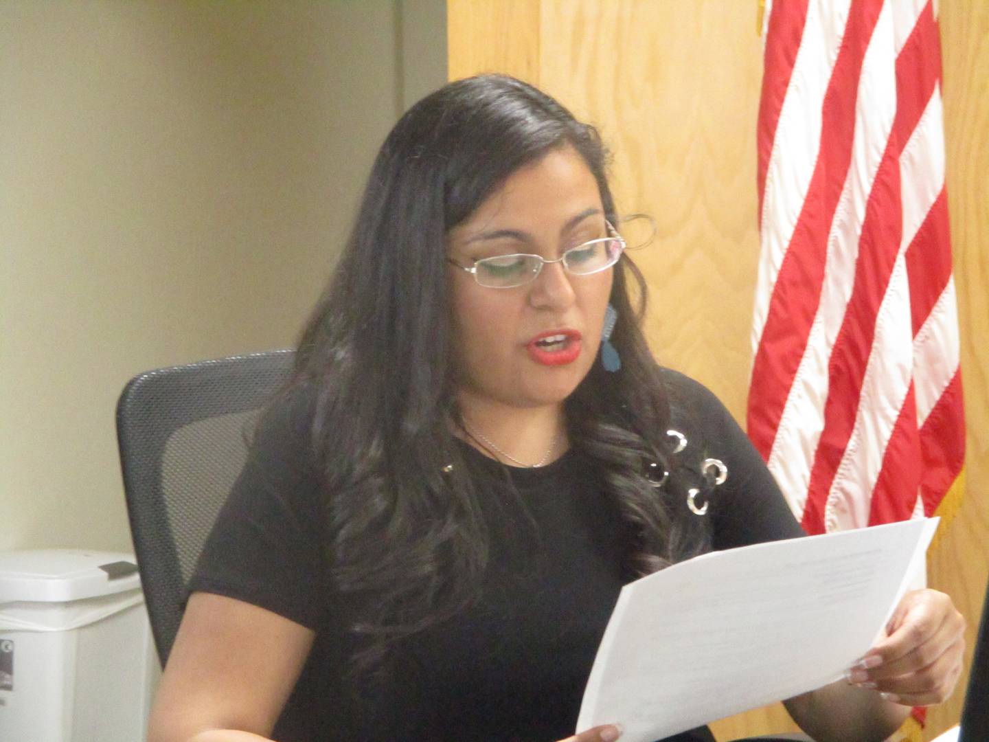 Joliet Township Trustee Tanya Arias reads a resolution recognizing the service of Trustee Ray Slattery at the last meeting on Tuesday for Slattery and other trustees with a new board coming into office. May 13, 2025