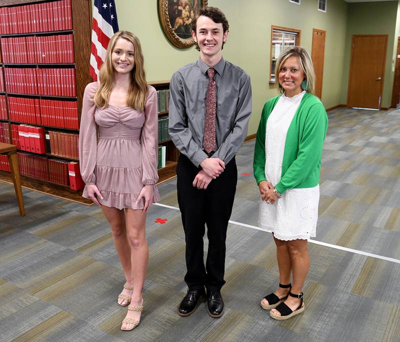 La Salle-Peru High School announced this year’s recipients of the Edward and Hilda Snow Scholarship are graduating seniors (from left) Carlie Miller and Connor Fundell. The scholarship was presented by Tammy Humpage (right) of Hometown National Bank.