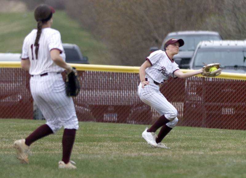Richmond-Burton's Ruby Gregurich catch a fly ball to end a Harvard rally during a Kishwaukee River Conference softball game on Thursday, April 9, 2026, at Richmond-Burton High School.