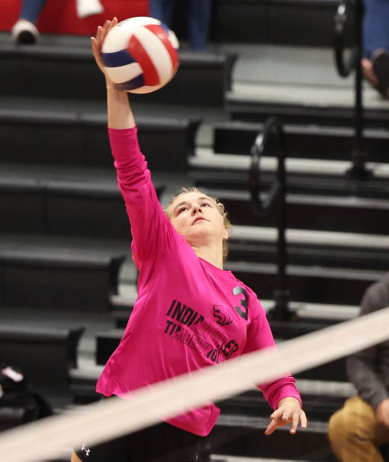 Indian Creek's Molly Feitlich spikes the ball during their match against DePue Thursday night at Indian Creek High School in Shabbona.