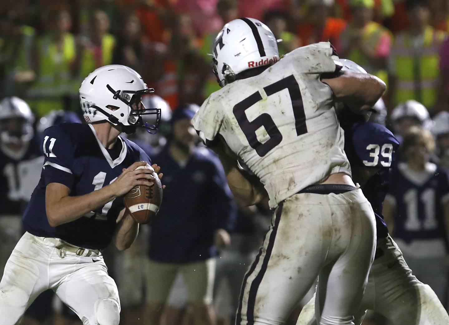 Cary-Grove's Peyton Seaburg ldrops back to throw a touchdown pass not eh fourth quarter to bring Cary-Grove within one point of Prairie Ridge during a Fox Valley Conference football game on Friday, Sept. 22, 2023, at Cary-Grove High School in Cary.