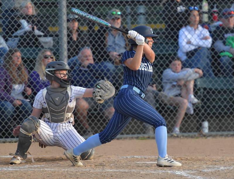 Downers Grove South’s Jordan Balsavich slashes a single to left field during a game against Downers Grove North on May 14, 2026 at McCollum Park in Downers Grove.