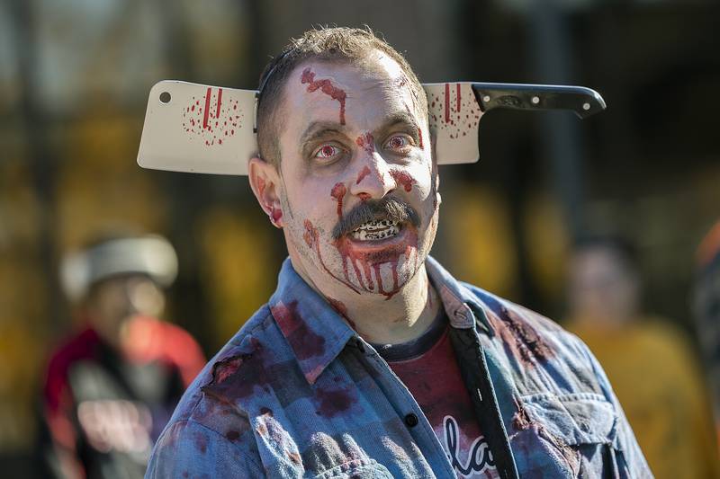 Insert requisite splitting headache joke here as Mike Long takes his kids around Dixon’s Treat Street Saturday, Oct. 26, 2024.
