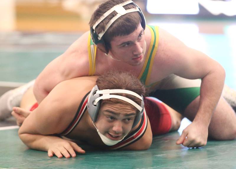 Seneca's Collin Wright wrestles Ottawa's Anthony Evans in the 170 weight class during a meet on Monday, Jan. 30, 2023 at Seneca High School.