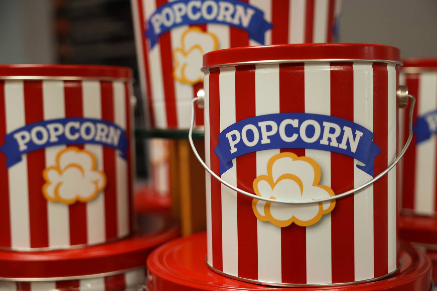 Popus Gourmet Popcorn offers a deal if you bring back your tin that you purchased at their store you get a refilled at half off for life.