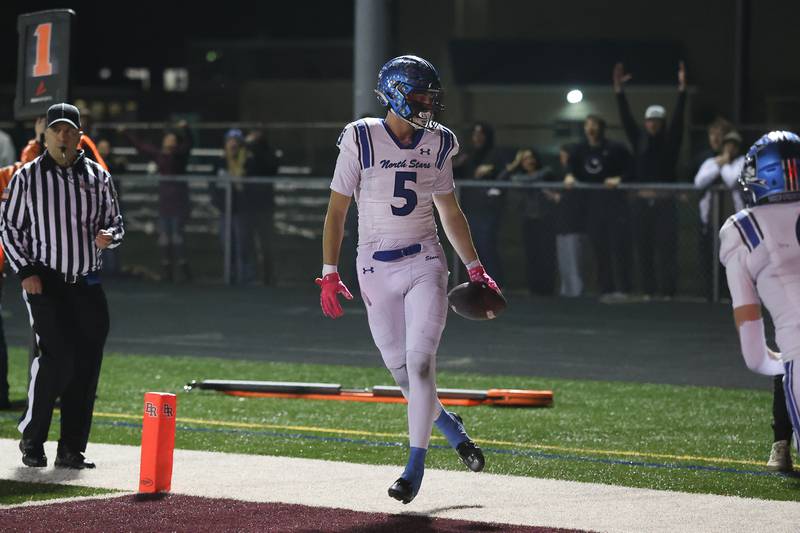 St. Charles North's Braden Harms scores against Brother Rice in the third round of the playoffs on Saturday, Nov. 15, 2025 in Chicago.