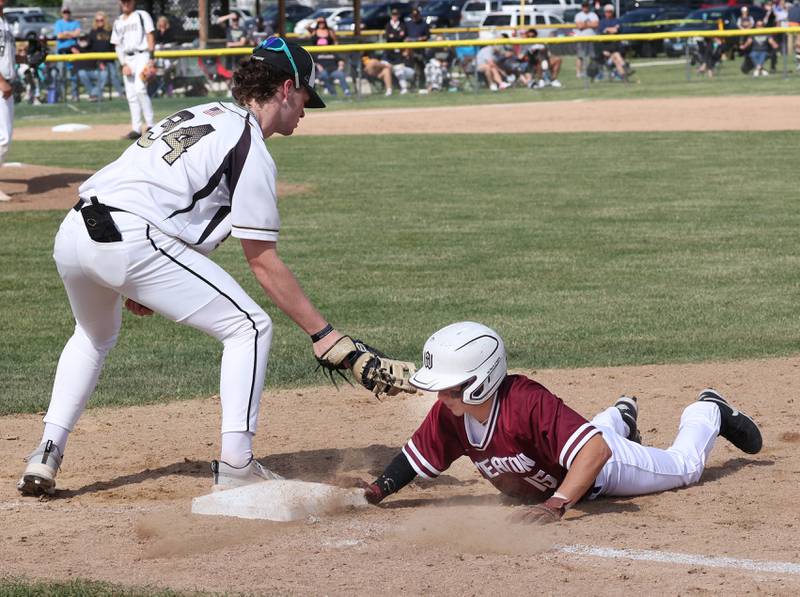 Wheaton Academy's Dominic Murrell gets back ahead of the tag of Sycamore's Davis Collie during their Class 3A sectional semifinal Wednesday, May 29, 2024, at the Sycamore Community Sports Complex.