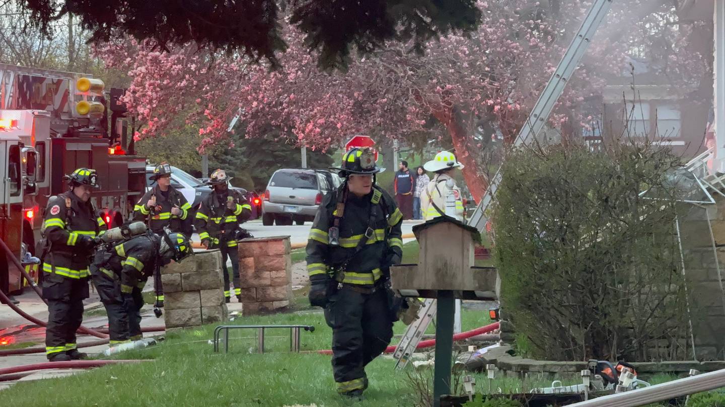 Joliet firefighters at the scene of a house fire in the 1000 block of  Highland Avenue on Saturday, April 4, 2026.