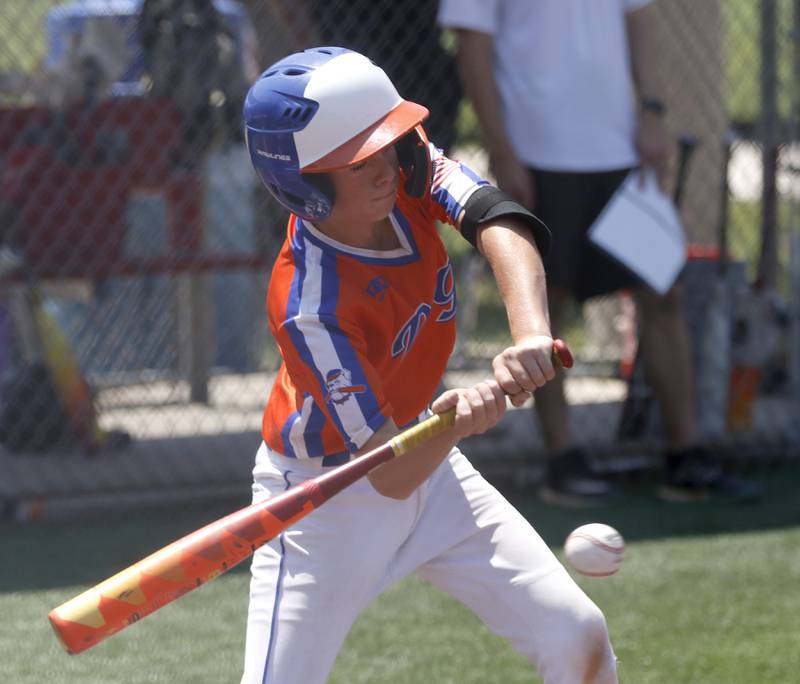 Windy City Hit Dog’s —Offdenkamp’s  Colin Jones swings a pitch during a semi-final baseball game against the Barrington Broncos Red in a Under 13 McHenry County Youth Sports Association’s Summer International Championship baseball tournament on Monday, July 14, 2025, at the Mickey Sund Baseball Complex in Crystal Lake's Lippold Park.