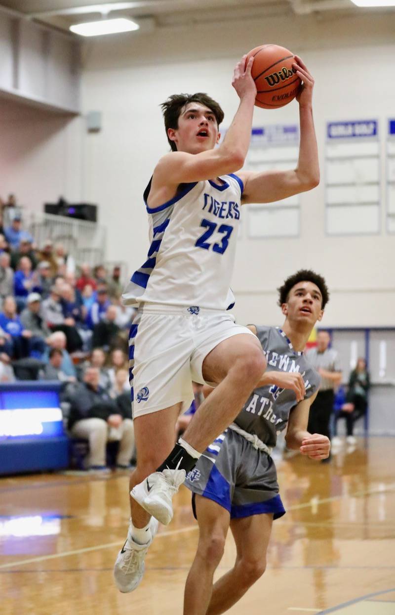 Princeton's Noah LaPorte soars for a shot against Newman Friday night at Prouty Gym.
