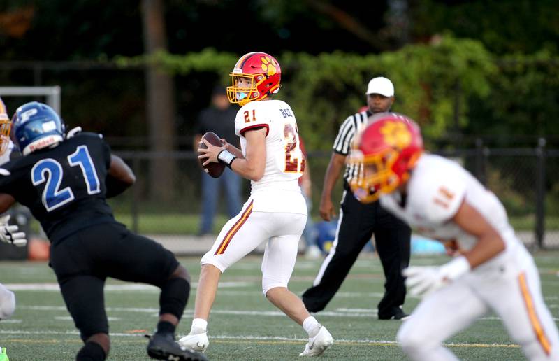 Batavia quarterback Ryan Boe looks to throw the ball during a game against Phillips at Gately Stadium in Chicago on Saturday, Aug. 27, 2022.