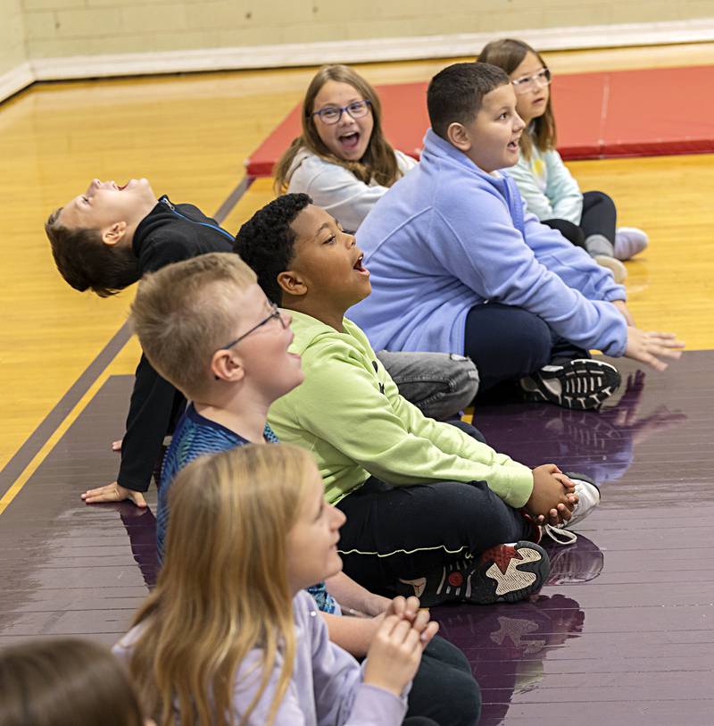 Third graders are instructed to yell and make noise if they are stuck in a burning house to alert the fire department during training at Jefferson School in Dixon Thursday, Oct. 12, 2023.