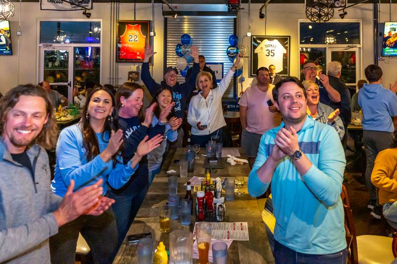 Patrons celebrate at the NFL Draft Watch Party to support former Nazareth quarterback J.J. McCarthy at Max in McCook.  April 25, 2024.