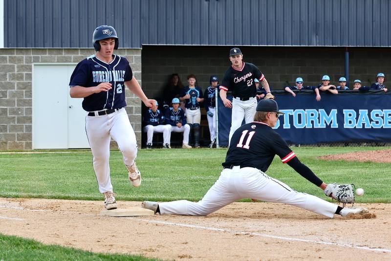 Bureau Valley's Tice Barkman beats the throw to first base despite the efforts of Orion's Bryan Peterson in Thursday's regional semifinal game at Manlius. Orion won 6-0.