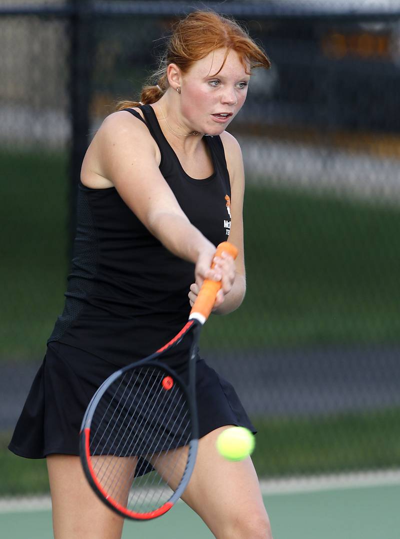 McHenry’s Lorelei Galvicius returns the the ball during a Fox Valley Conference tennis match on Monday, Sept. 25, 2023, at Crystal Lake Central High School.