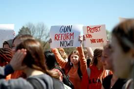 Hundreds of students at Batavia High School walk out of class to protest gun violence
